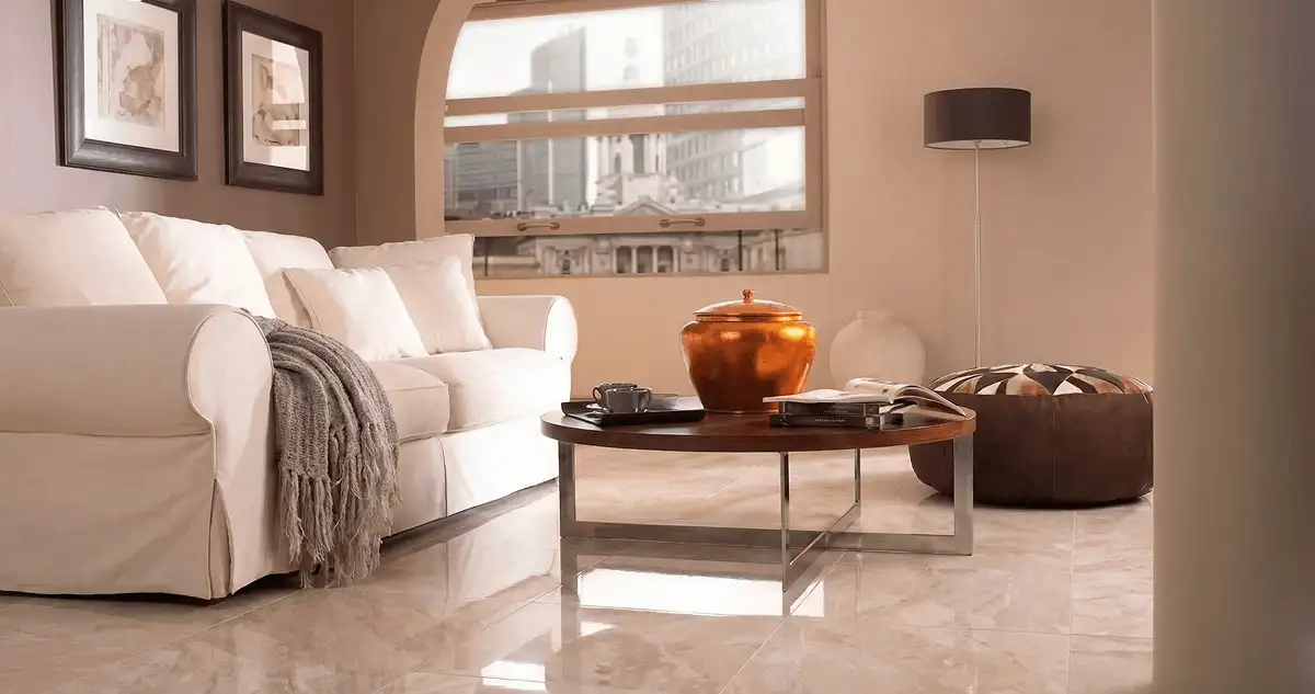 Modern living room with professionally installed marble flooring, a beige sofa, coffee table in Green Bay, WI