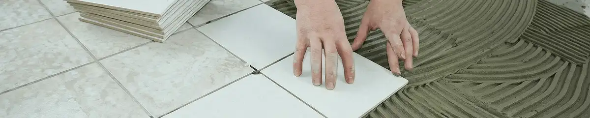 Professional installing white tile floors in Green Bay, WI