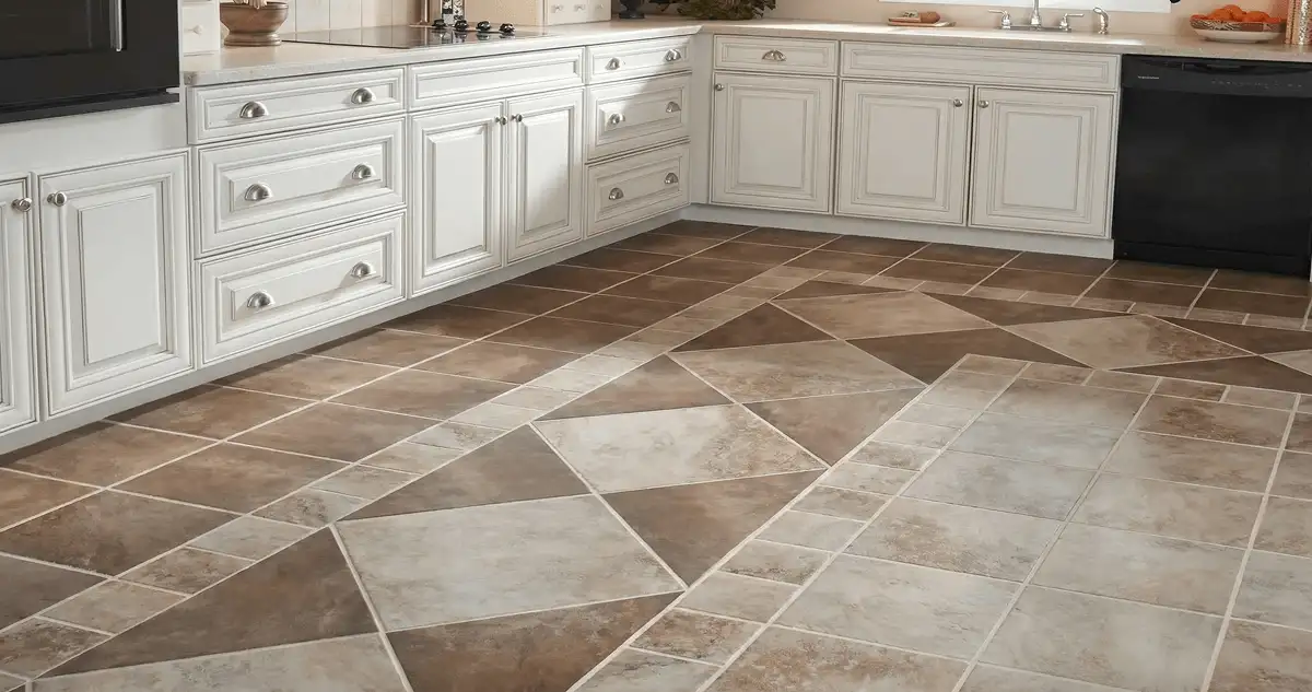 Kitchen with white cabinets and a professionally installed tile floor in Green Bay, WI