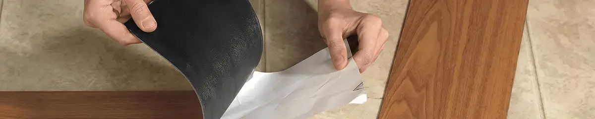 A professional installing vinyl flooring in Green Bay, WI